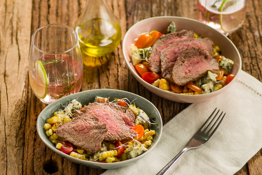 Recipe for rump roast beef with roasted corn salad, cherry tomato and gorgonzola