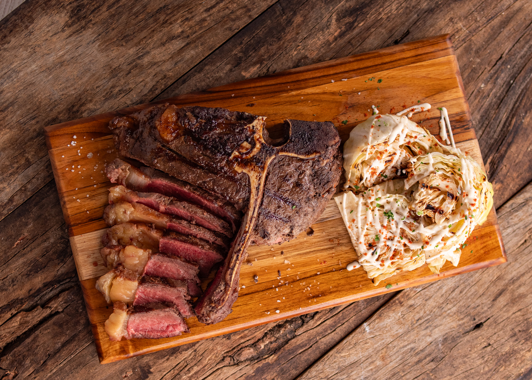 Prepare a juicy Estância 92 T-bone with grilled cabbage and mayonnaise sauce